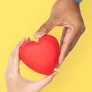 hands-holding-heart-love-relationship-concept.-web